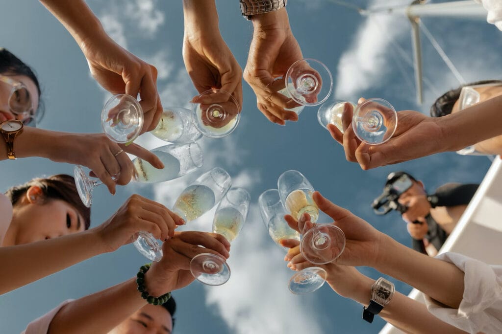 friends and family enjoying a New Year's toast on a luxury yacht in St.