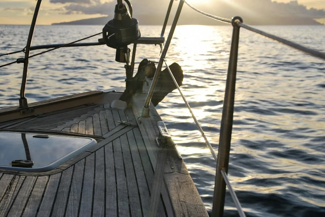 A brown boat sailing on the sea symbolizes the essence of maritime adventure.