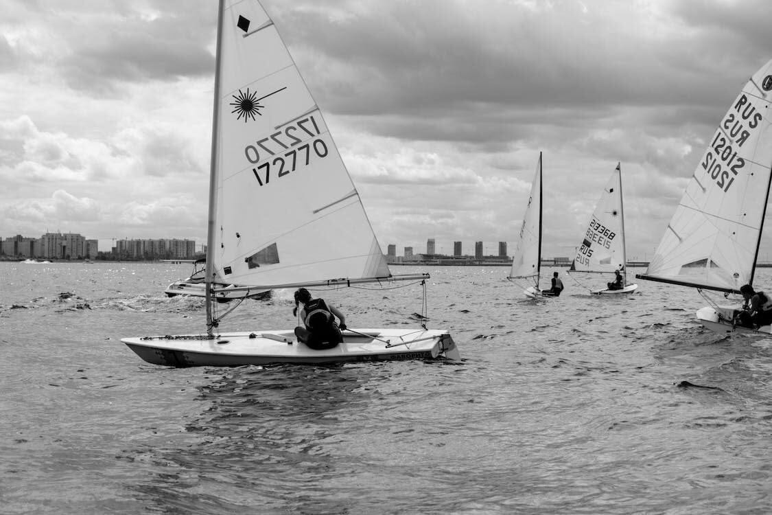 A grayscale photo of a regatta event