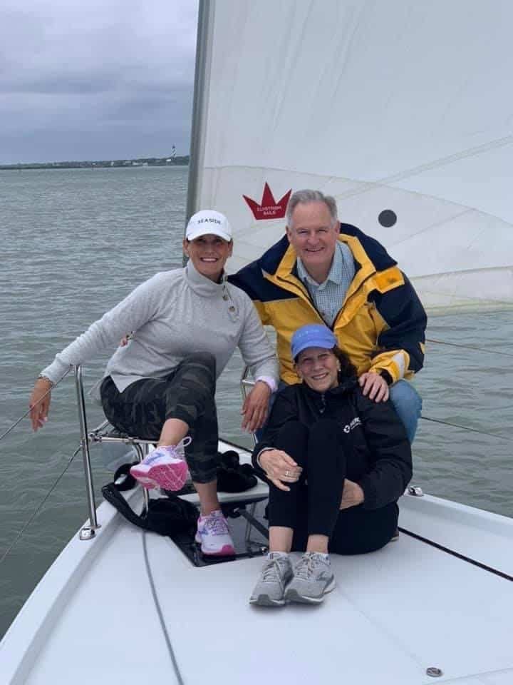 a family enjoying fresh air on a luxury yacht